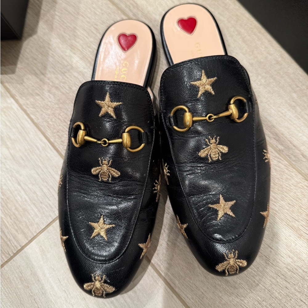 Gucci Black Leather Loafers with Gold Embellishments